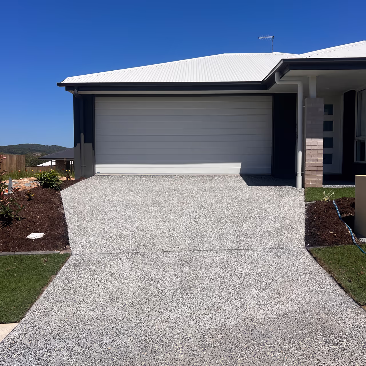 Sealed Inspire driveway with a sleek matte finish